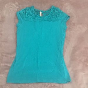 I am selling a blue greenish shirt